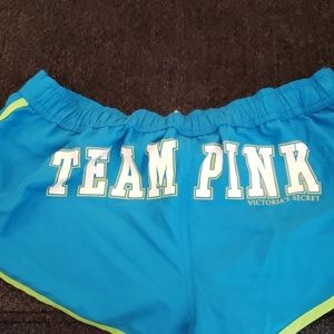 Vintage TEAM PINK polyester swim shorts like new